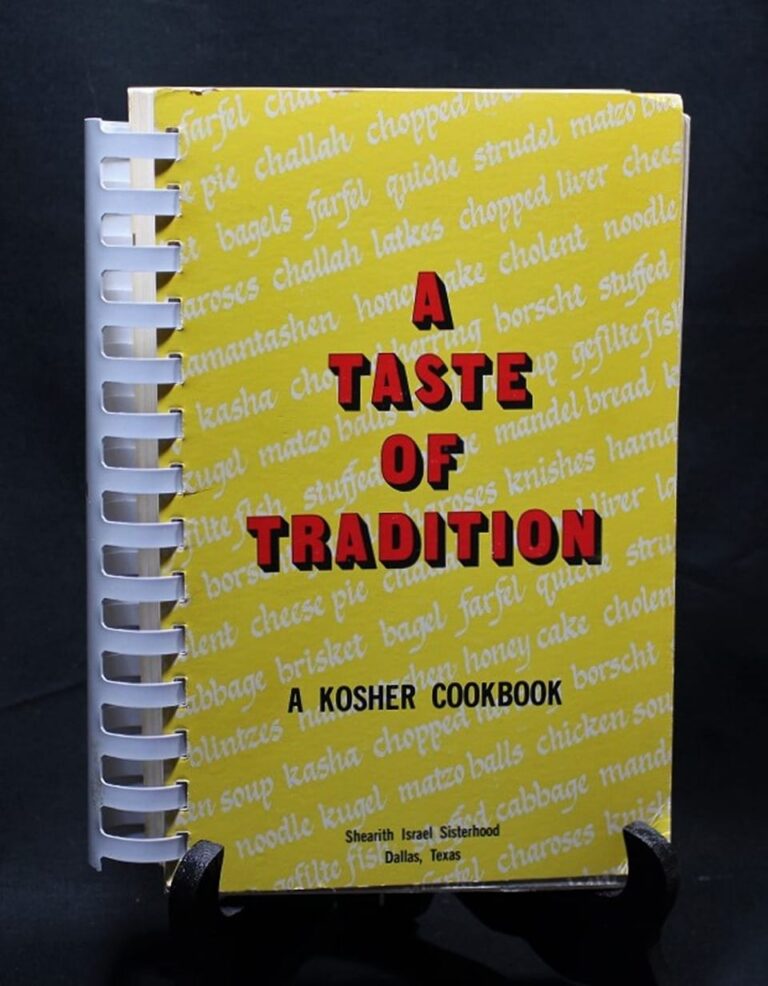 A spiral-bound cookbook titled “A Taste of Tradition: A Kosher Cookbook” on a black background.