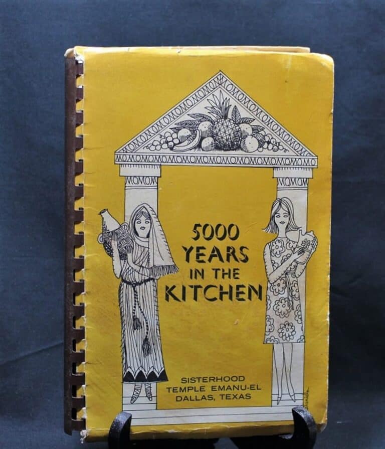 Yellow cookbook titled “5000 Years in the Kitchen,” with two women and a temple illustration on the cover.