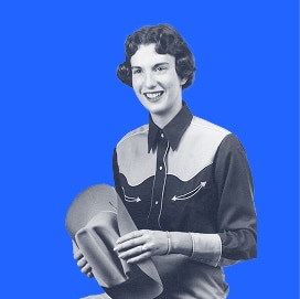 Smiling person in a western shirt holding a cowboy hat, with a solid blue background.