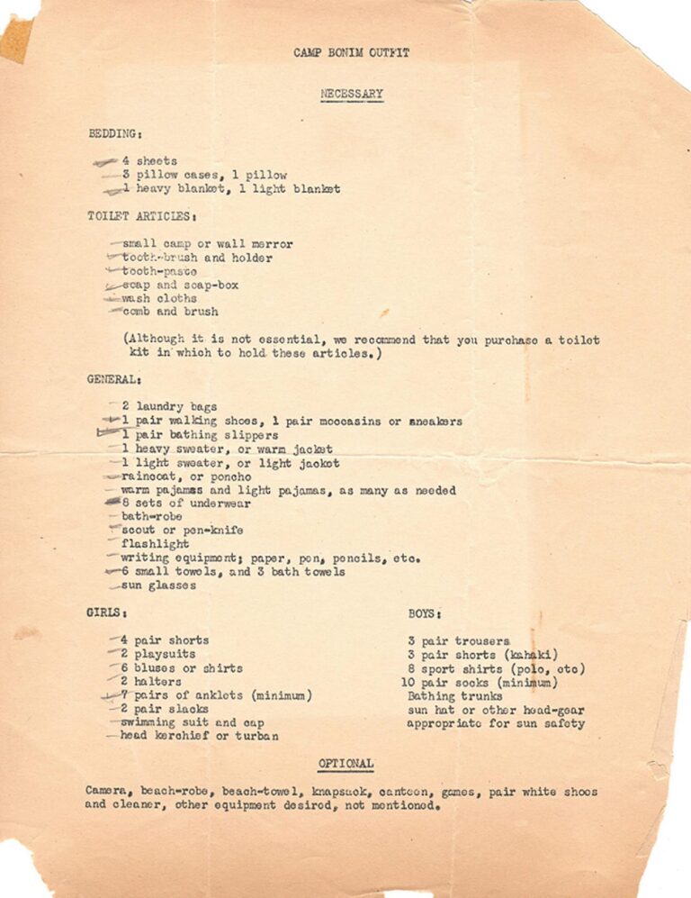 A typed camp packing list on yellowed paper, detailing clothing and personal items for boys and girls.
