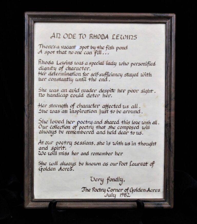 Framed poem titled “An Ode to Rhoda Lewins,” honoring her character, poetry, and influence, dated July 1982.
