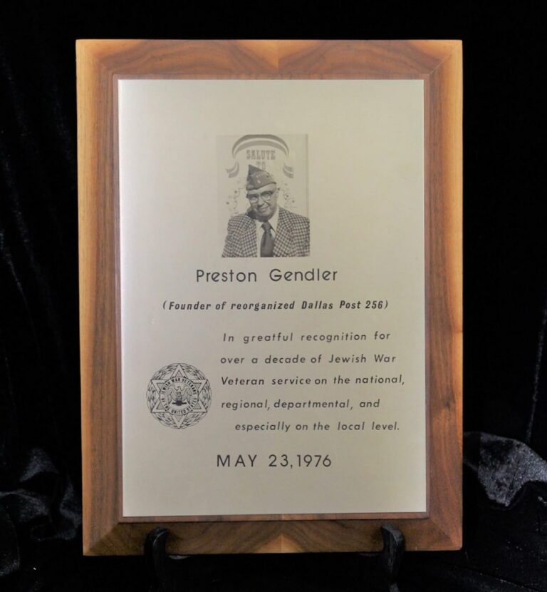 Plaque honoring Preston Gendler for Jewish War Veteran service, dated May 23, 1976, with a black and white photo.