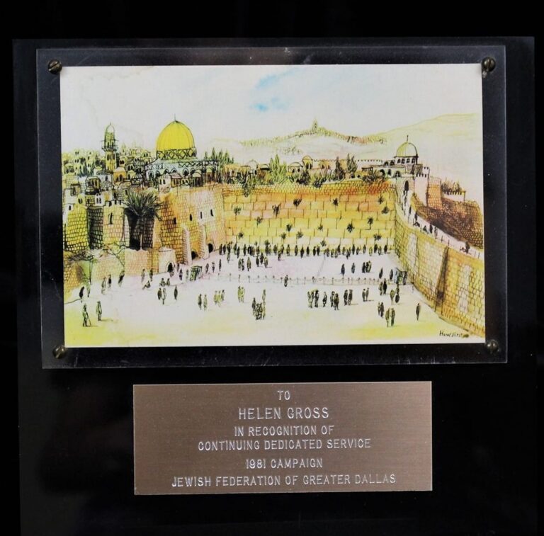 Plaque with a painting of Jerusalem above a dedication to Helen Gross for service to the Jewish Federation of Greater Dallas.