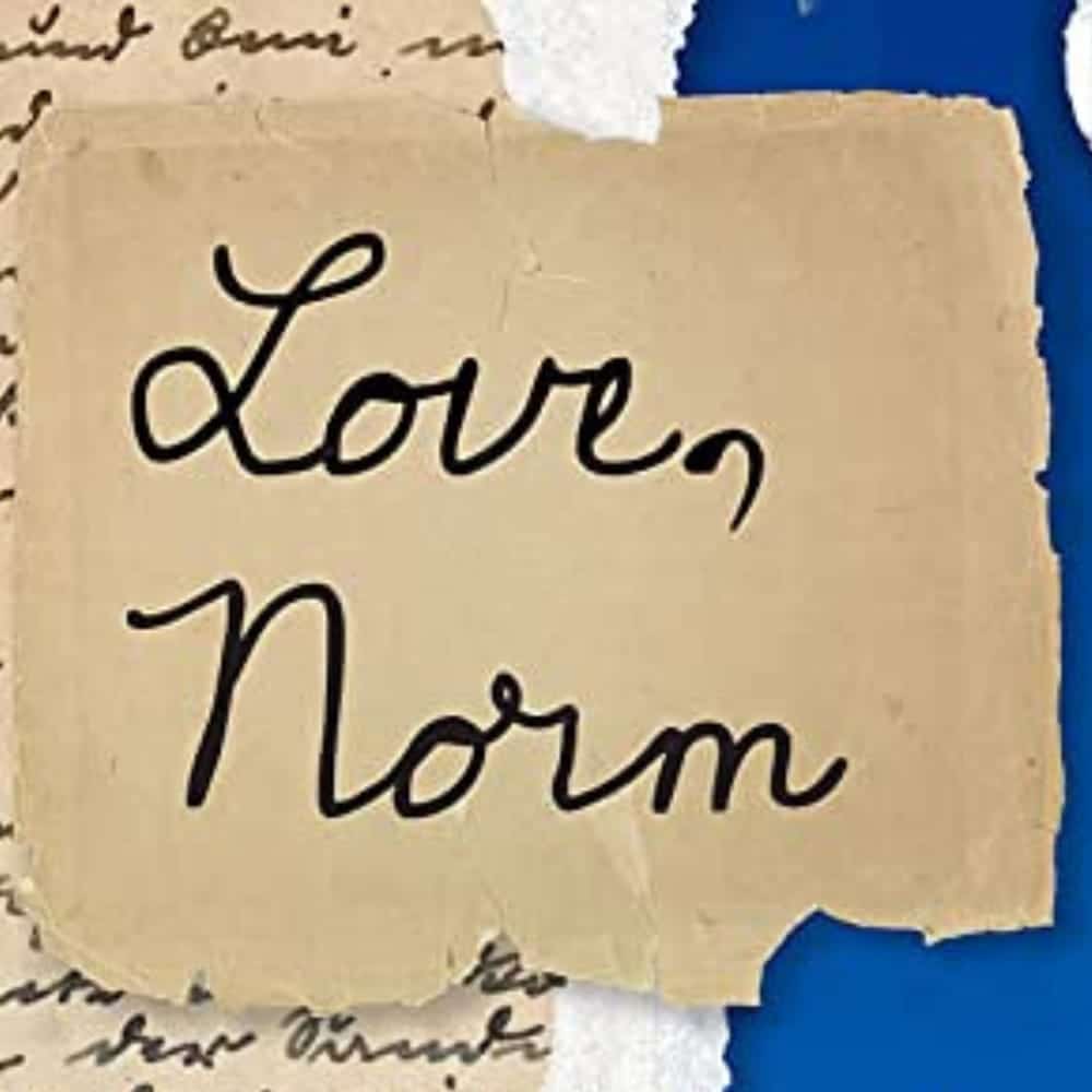 A torn piece of paper with handwritten text that says “Love, Norm” over a background of old handwriting.