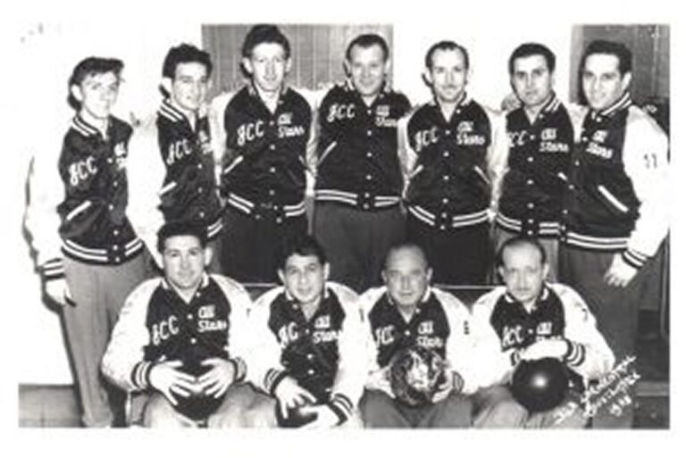 Ten men in matching “ECC All Stars” jackets pose indoors, with three holding bowling balls in the front row.